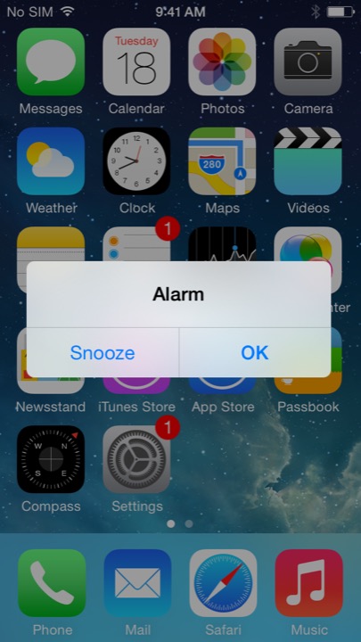 Alarm Home Screen on iPhone 5S + iPhone 5C running iOS 7.1.1