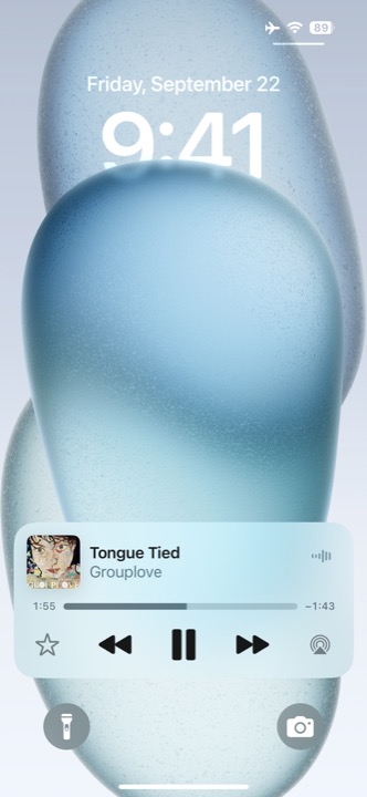 Lock Screen Now Playing on iPhone 15 running iOS 18