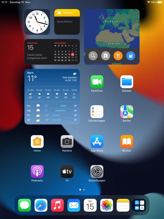Home Screen Dark Portrait on iPad 9.7-inch + 7.9-inch running iPadOS 15